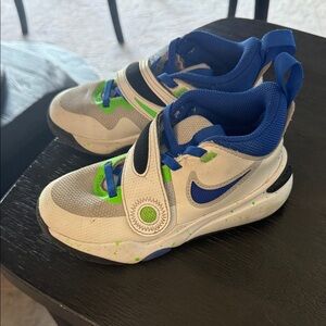 Nike Kids' White and Blue Sneakers with Green Accents